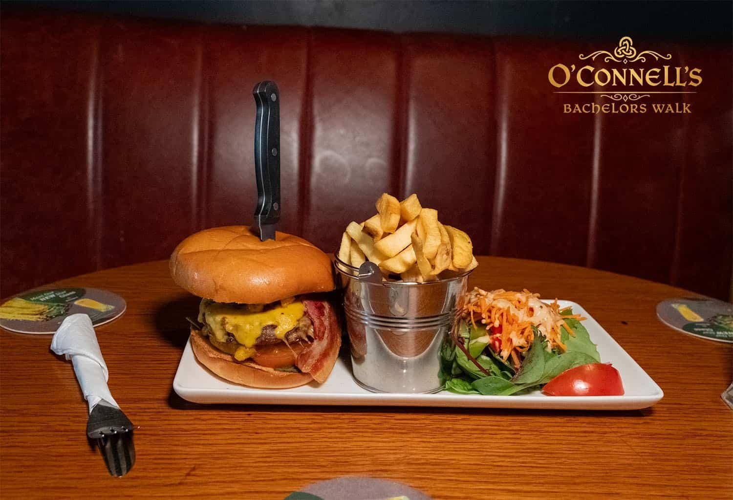 Classic burger with fries and salad at O'Connell's Bar Dublin.
