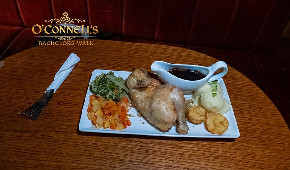 Roast chicken with vegetables and gravy at O'Connell's Bar Dublin.